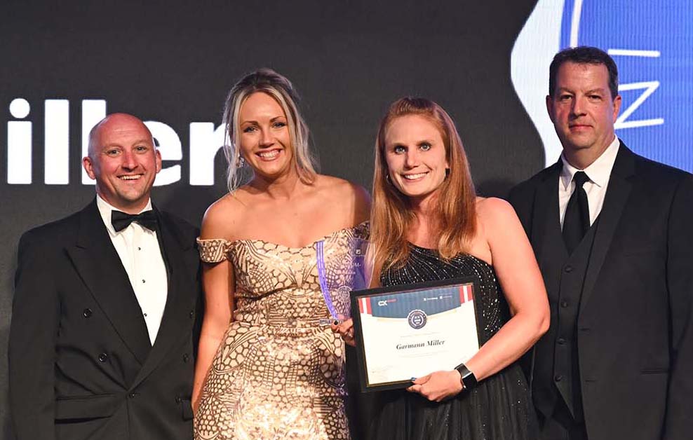 Garmann Miller team member Kristi Shaner accepting Zweig Client Experience Award Close Up