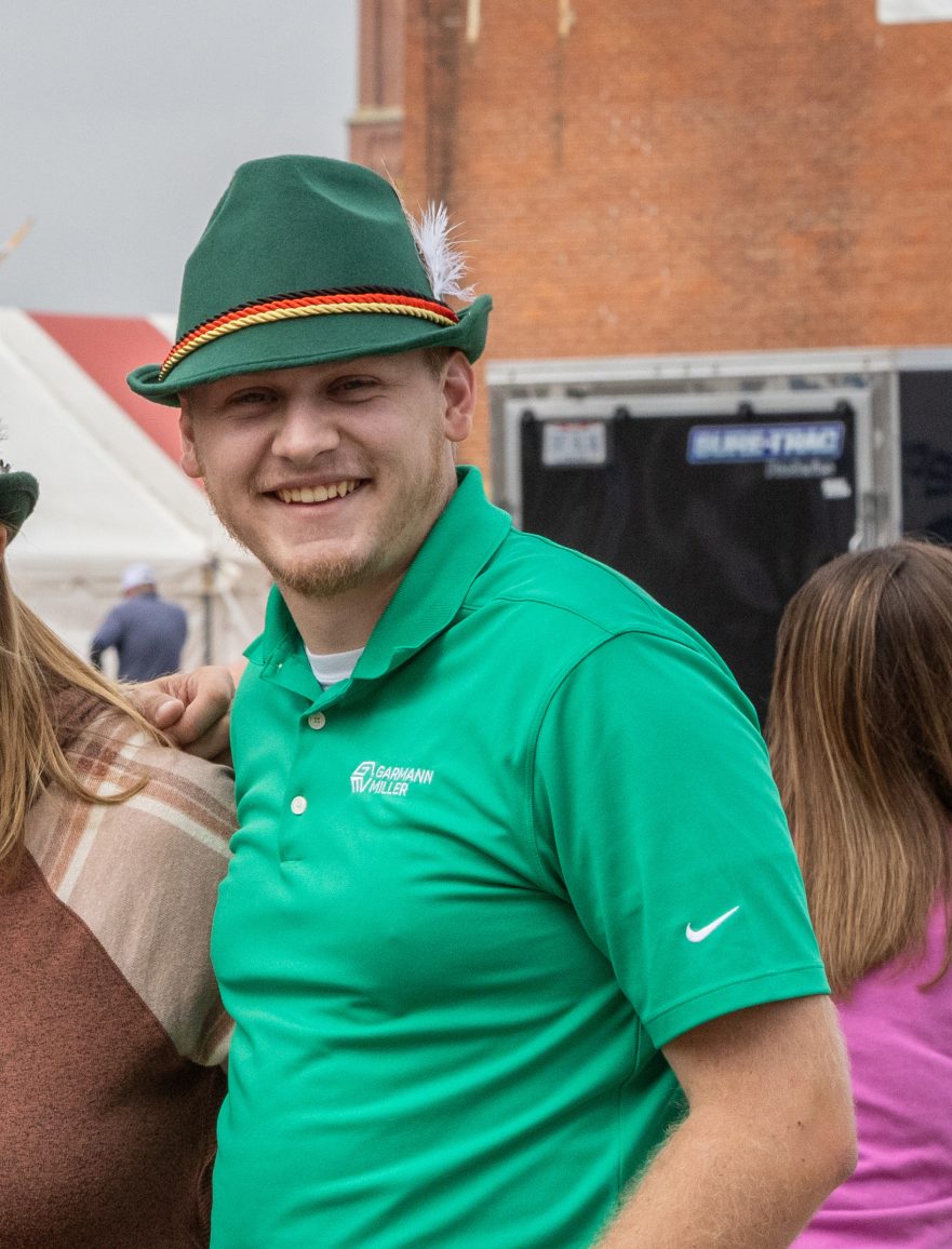 Garmann Miller team member Isaac Wendel posing for photo