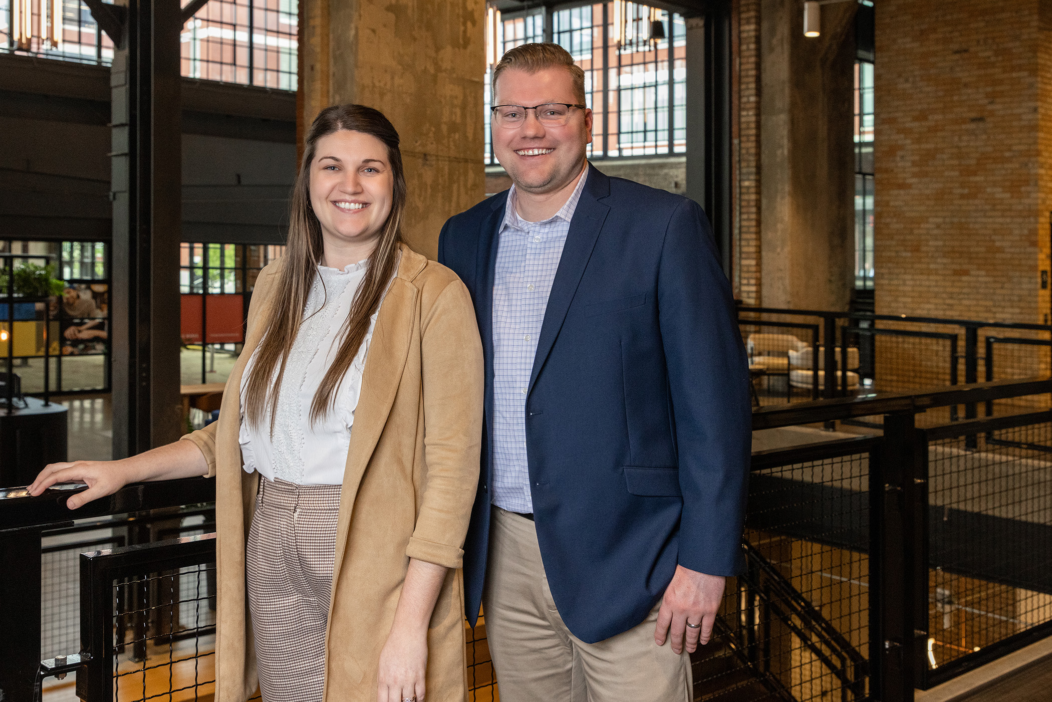Garmann Miller team members Derek and Taylor posing for photo